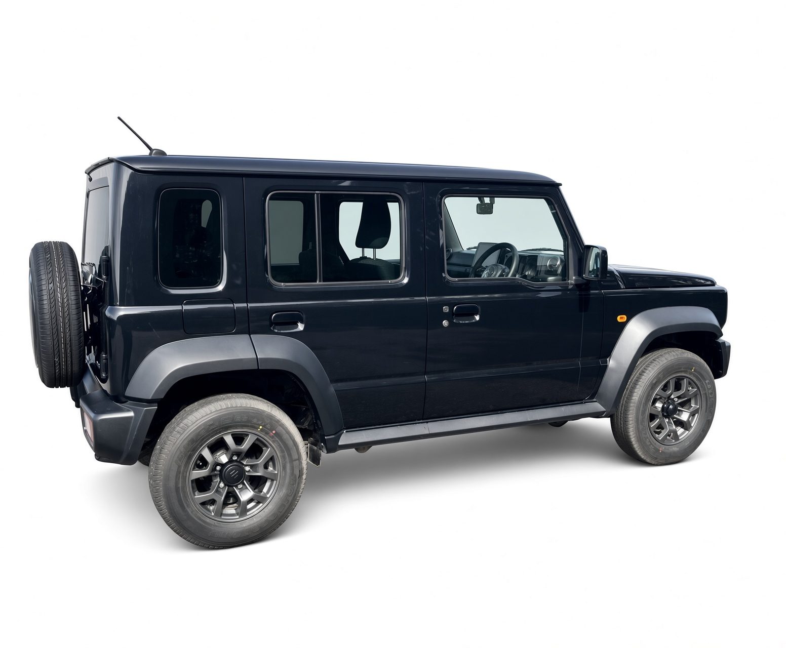 Black 5-door Suzuki Jimny rear side with spare wheel